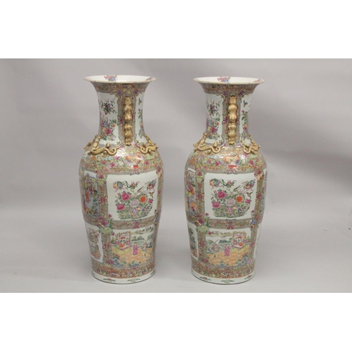 115 - AN IMPRESSIVE PAIR OF CHINESE CANTON FAMILLE ROSE PORCELAIN FLOOR-STANDING VASES, beautifully painte... 