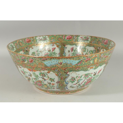 116 - A LARGE AND FINE 19TH CENTURY CHINESE CANTON FAMILLE ROSE PORCELAIN PUNCH BOWL, enamel painted with ... 