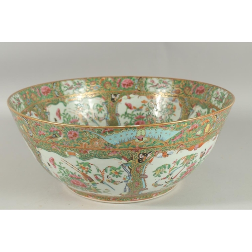 116 - A LARGE AND FINE 19TH CENTURY CHINESE CANTON FAMILLE ROSE PORCELAIN PUNCH BOWL, enamel painted with ... 