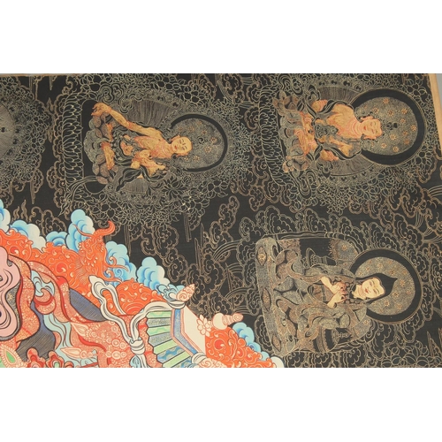 127 - A TIBETAN THANGKA, mounted on paper.