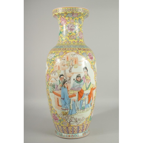 151 - A LARGE CHINESE FAMILLE JAUNE PORCELAIN VASE, painted with two large panels of figures and smaller p... 