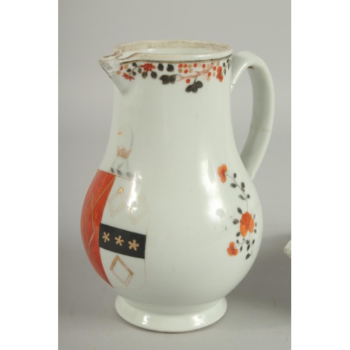 152 - AN ARMORIAL PORCELAIN JUG AND QUATREFOIL DISH, (af), jug 18cm high, dish 21.5cm wide, (2).