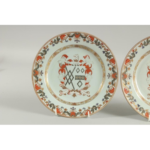 153 - A PAIR OF CHINESE EXPORT ARMORIAL PORCELAIN PLATES, finely painted with central coat of arms with fo... 