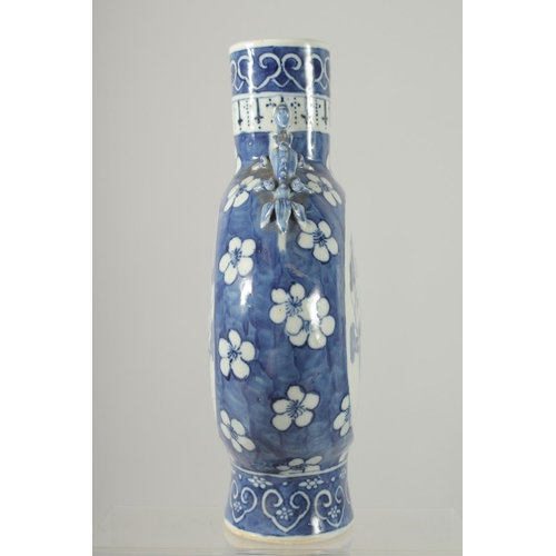 156 - A CHINESE BLUE AND WHITE PORCELAIN MOON FLASK, with moulded chilong handles to the shoulders, each s... 