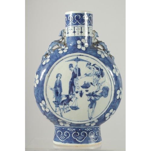 156 - A CHINESE BLUE AND WHITE PORCELAIN MOON FLASK, with moulded chilong handles to the shoulders, each s... 