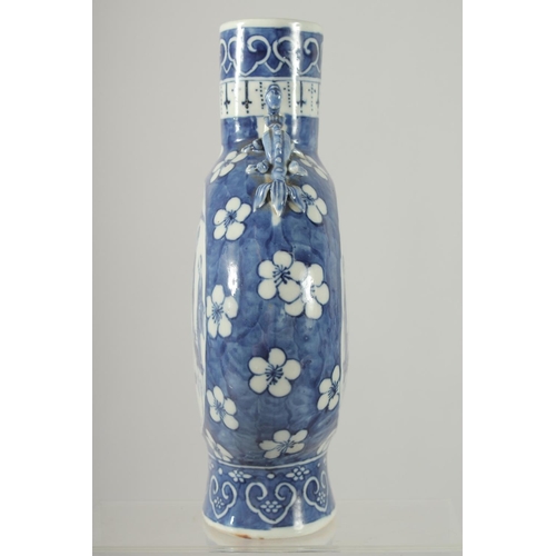 156 - A CHINESE BLUE AND WHITE PORCELAIN MOON FLASK, with moulded chilong handles to the shoulders, each s... 