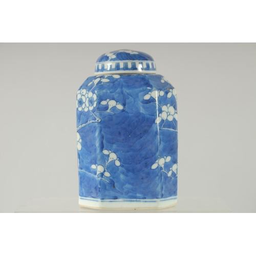 157 - A CHINESE BLUE AND WHITE PORCELAIN OCTAGONAL JAR AND COVER, painted with prunus blossom, base with f... 