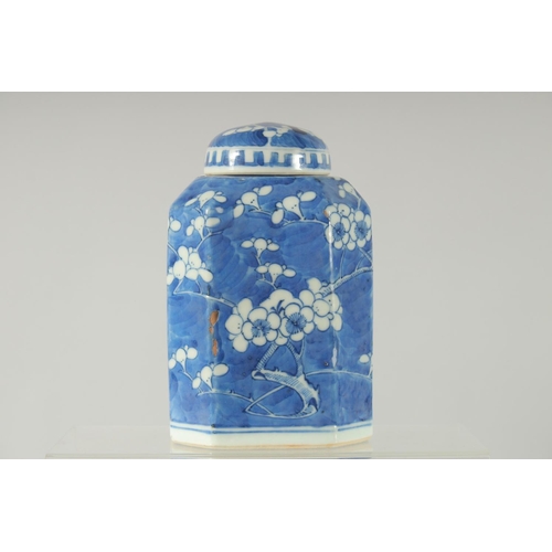 157 - A CHINESE BLUE AND WHITE PORCELAIN OCTAGONAL JAR AND COVER, painted with prunus blossom, base with f... 