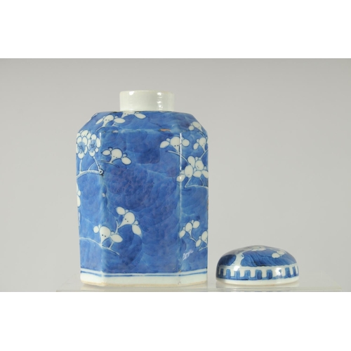 157 - A CHINESE BLUE AND WHITE PORCELAIN OCTAGONAL JAR AND COVER, painted with prunus blossom, base with f... 