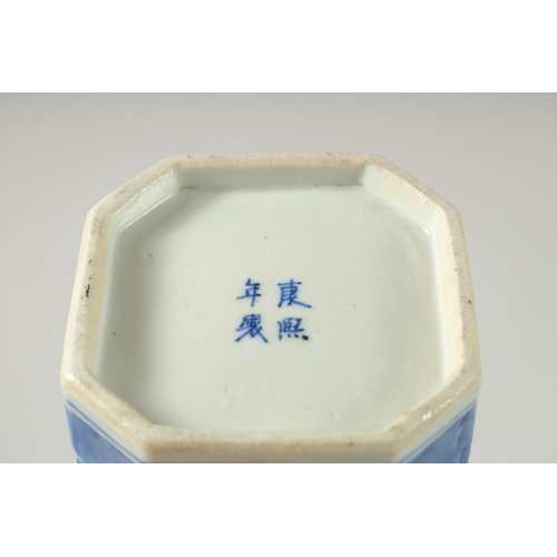 157 - A CHINESE BLUE AND WHITE PORCELAIN OCTAGONAL JAR AND COVER, painted with prunus blossom, base with f... 