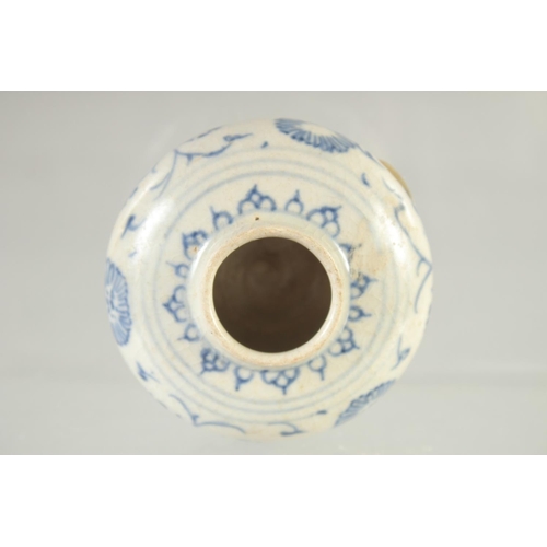 159 - A SMALL CHINESE BLUE AND WHITE GLAZED POTTERY WATER POT, painted with foliate motifs, with applied s... 