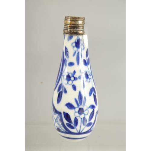 16 - A BLUE AND WHITE PORCELAIN SCENT BOTTLE.