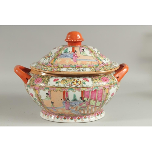 167 - A CHINESE CANTON FAMILLE ROSE PORCELAIN TUREEN AND COVER, painted with panels of scenes with figures... 