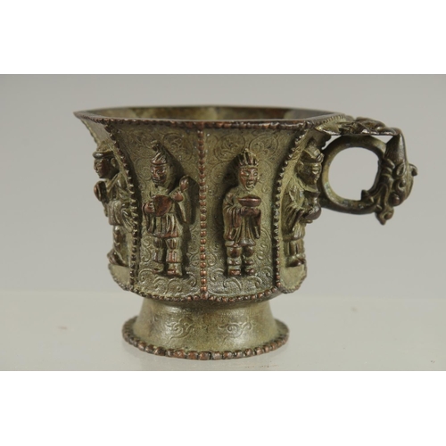 172 - A CHINESE BRONZE CUP WITH RELIEF CAST FIGURES, mark to base possibly Da Tang Zhen Guan (true officia... 