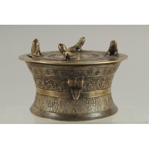 173 - AN ANNAMESE BRONZE RAIN DRUM WITH RELIEF CAST FROGS, 16cm diameter.