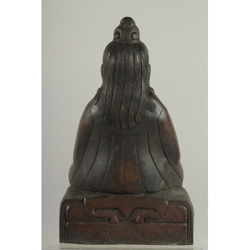 175 - A FINE TIBETAN BRONZE FIGURE OF LAMA TROPTE TUNGDEN DJABO, with long beard and hair gathered in a bu... 