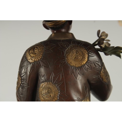 176 - A FINE AND LARGE JAPANESE MEIJI BRONZE AND CLOISONNE FIGURAL LAMP, with okimono of a man holding a b... 