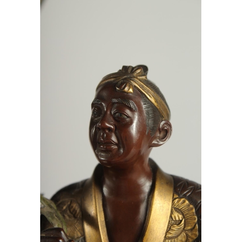 176 - A FINE AND LARGE JAPANESE MEIJI BRONZE AND CLOISONNE FIGURAL LAMP, with okimono of a man holding a b... 