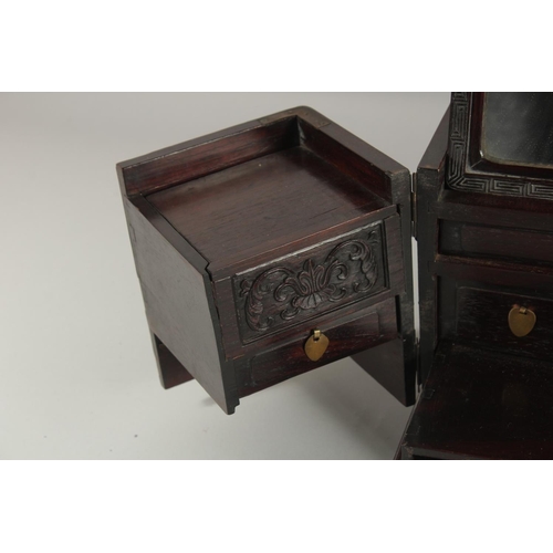 181 - A FINE 19TH CENTURY CHINESE INLAID HARDWOOD TRAVELLING VANITY BOX, inlaid with mother of pearl, soap... 