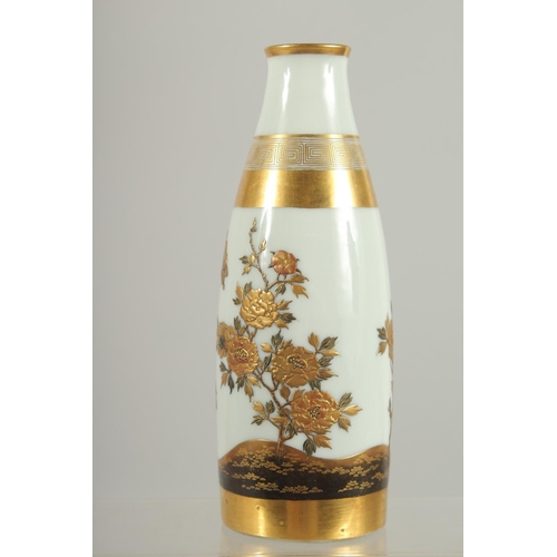 192 - A FINE JAPANESE GILDED PORCELAIN VASE, with raised decoration depicting flowers, signed, 18cm high.