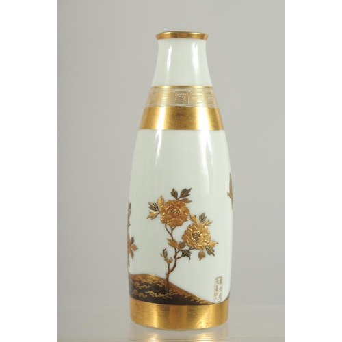 192 - A FINE JAPANESE GILDED PORCELAIN VASE, with raised decoration depicting flowers, signed, 18cm high.