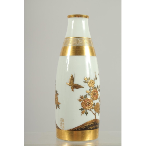 192 - A FINE JAPANESE GILDED PORCELAIN VASE, with raised decoration depicting flowers, signed, 18cm high.