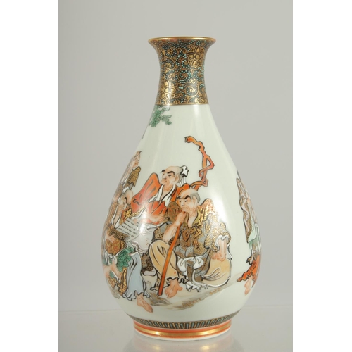 193 - A JAPANESE KUTANI PORCELAIN BOTTLE VASE, painted with figures with fine gilt highlights, the base wi... 