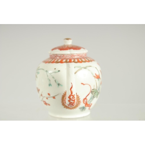 198 - A FINE JAPANESE KUTANI PORCELAIN MINIATURE TEAPOT, painted with flora and embellished with gilt high... 