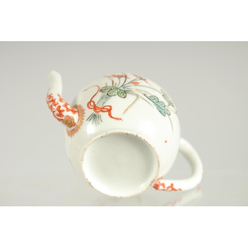 198 - A FINE JAPANESE KUTANI PORCELAIN MINIATURE TEAPOT, painted with flora and embellished with gilt high... 