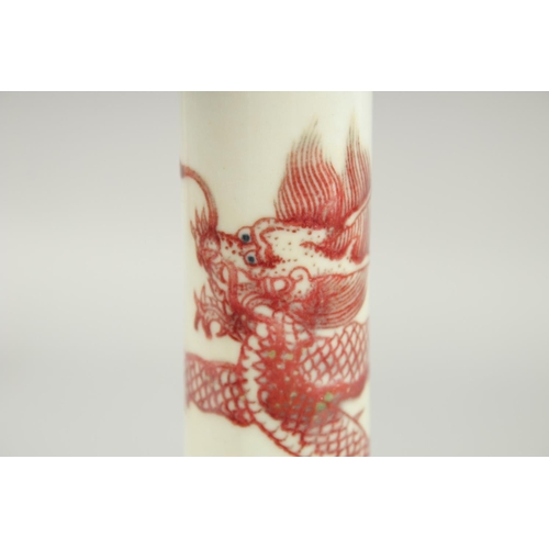 202 - A CHINESE COPPER RED AND WHITE PORCELAIN BOTTLE VASE, the neck with coiled dragon, six-character mar... 