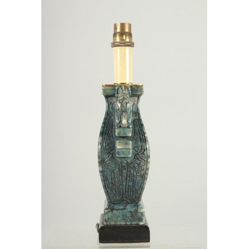 204 - A CHINESE HARDSTONE TWIN HANDLE VASE LAMP, 29cm high overall.