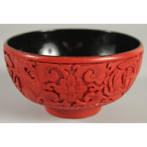 21 - A CHINESE CINNABAR LACQUER BOWL, 12.5cm diameter.