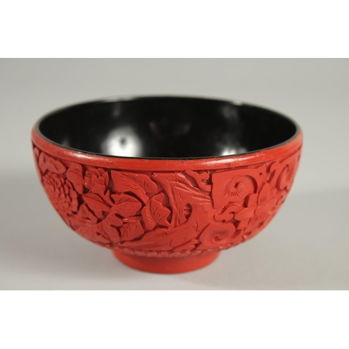 21 - A CHINESE CINNABAR LACQUER BOWL, 12.5cm diameter.