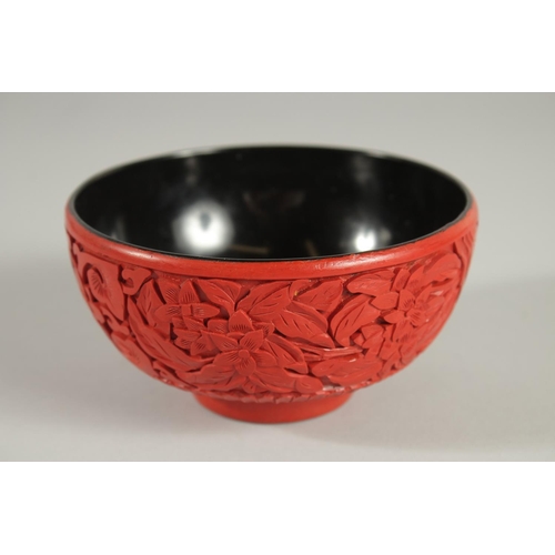 21 - A CHINESE CINNABAR LACQUER BOWL, 12.5cm diameter.