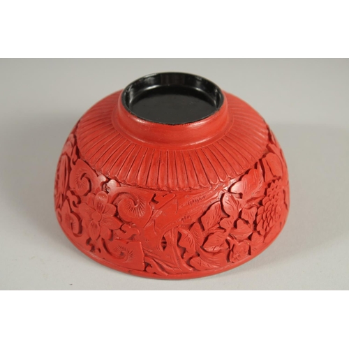 21 - A CHINESE CINNABAR LACQUER BOWL, 12.5cm diameter.