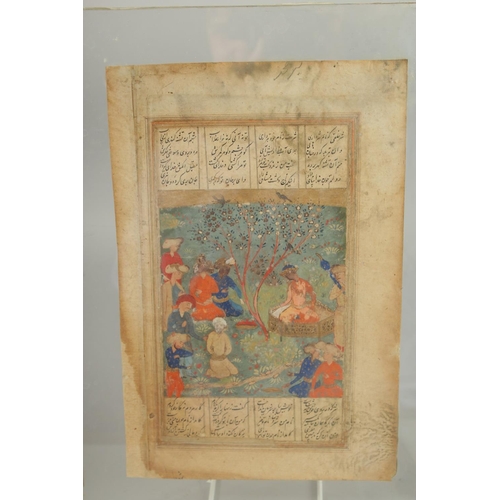 218 - A PERSIAN SAFAVID MINIATURE PAINTING, depicting figures in a garden, with panels of calligraphy, sea... 