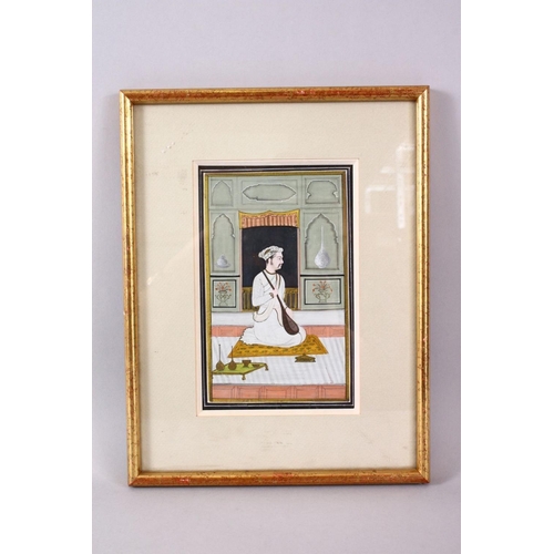 224 - AN INDIAN MINIATURE PAINTING depicting a seated prince holding a sitar, image size 18cm x 11cm.