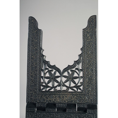 229 - A FINELY ENGRAVED MID-19TH CENTURY INDIAN EBONY QURAN STAND, 36.5cm wide at base (opened).