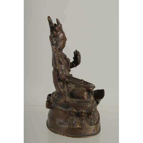 235 - A 17TH-18TH CENTURY CHINESE OR TIBETAN BRONZE BUDDHA, 9cm high.