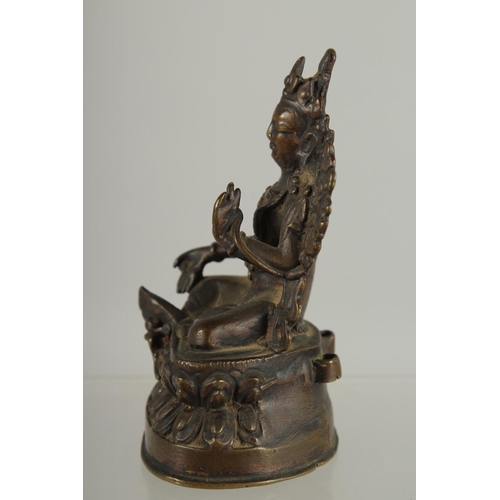 235 - A 17TH-18TH CENTURY CHINESE OR TIBETAN BRONZE BUDDHA, 9cm high.