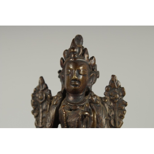 235 - A 17TH-18TH CENTURY CHINESE OR TIBETAN BRONZE BUDDHA, 9cm high.