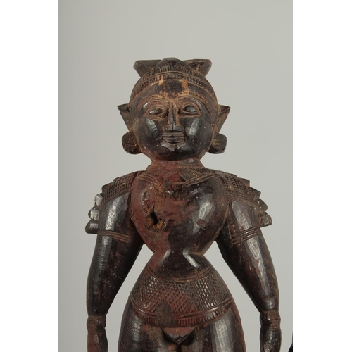 237 - TWO 19TH CENTURY SOUTH INDIAN -POSSIBLY TAMIL NADU CARVED WOOD FIGURES, 32cm and 30cm high.