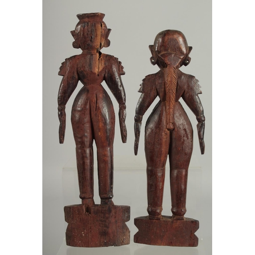 237 - TWO 19TH CENTURY SOUTH INDIAN -POSSIBLY TAMIL NADU CARVED WOOD FIGURES, 32cm and 30cm high.