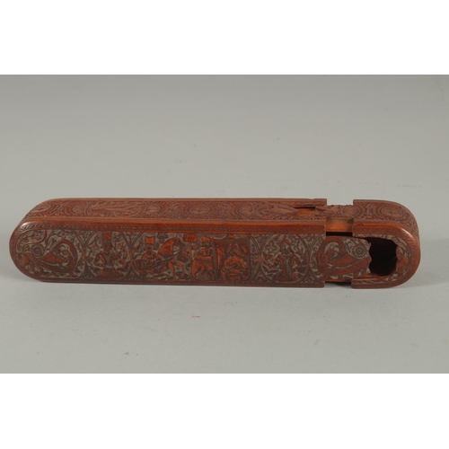 242 - A FINE 19TH CENTURY PERSIAN QAJAR ABADEH CARVED WOODEN QALAMDAN PEN BOX, 21cm long.