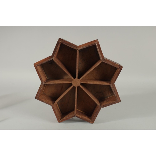 243 - A FINE 19TH CENTURY PERSIAN QAJAR ABADEH CARVED WOOD STAR-SHAPE BOX, the lid with carved and pierced... 