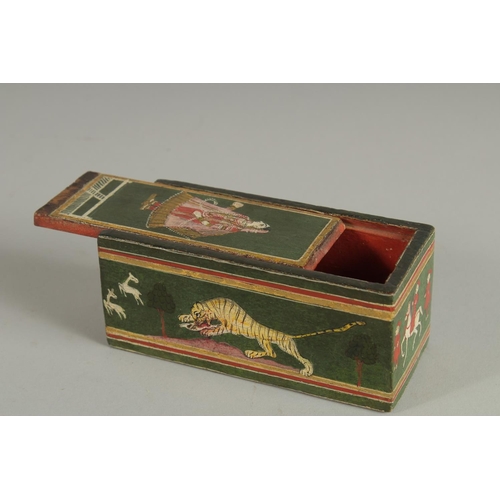 245 - A 19TH CENTURY INDIAN LACQUERED GANJIVA BOX, painted with figures and a tiger, 12.5cm x 5.5cm.