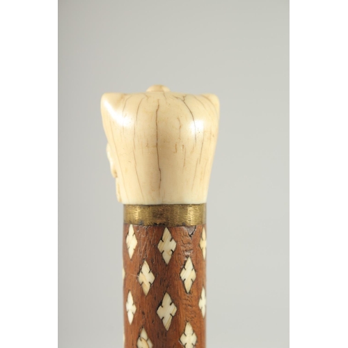 246 - A FINE EARLY 19TH CENTURY MUGHAL INDIAN BONE INLAID WOODEN CANE, 92.5cm high.