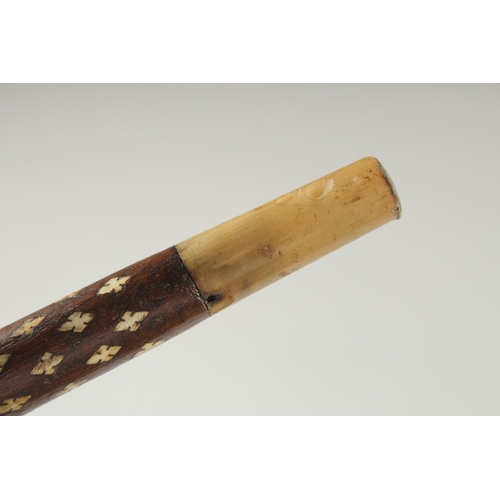 246 - A FINE EARLY 19TH CENTURY MUGHAL INDIAN BONE INLAID WOODEN CANE, 92.5cm high.