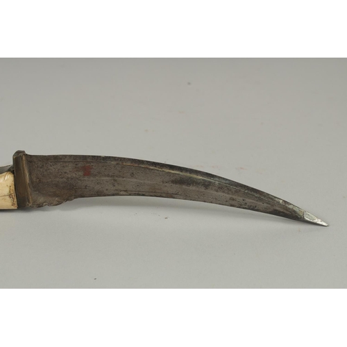 247 - AN 18TH-19TH CENTURY MUGHAL INDIAN BONE HILTED PESH KABZ DAGGER, 28cm long.