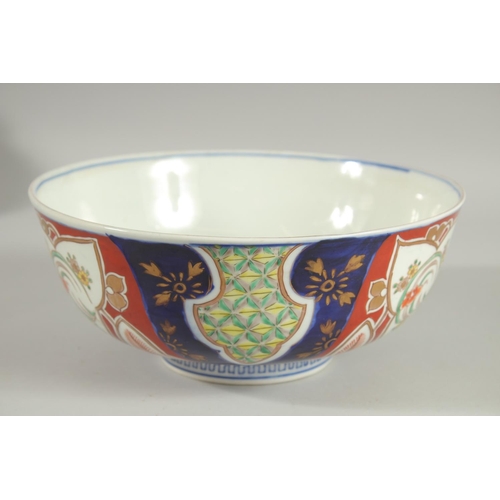 25 - A LARGE JAPANESE IMARI PORCELAIN BOWL, painted with various foliate motifs and gilt highlights, char... 